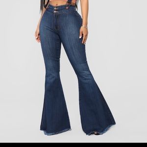 overall denim flare jeans .